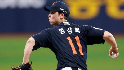 엄상백 불펜 반등 vs 안치홍 부진…한화, 고액 FA 희비 교차